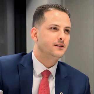 Emad Rahall logo
