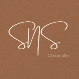 SNS Chocolatier logo