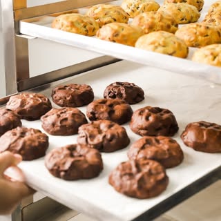 Between Bakery logo