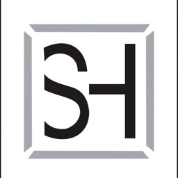 S H Real Estate logo