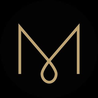 M Designs logo