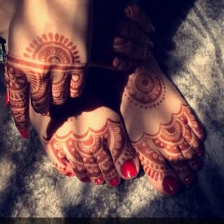 Henna Shim logo