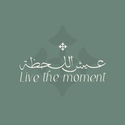 Live The Moment logo