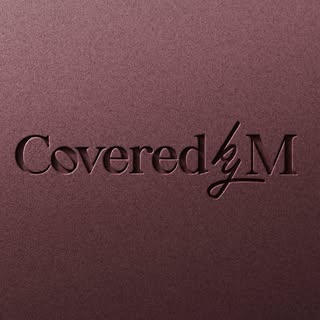 Covered by M logo